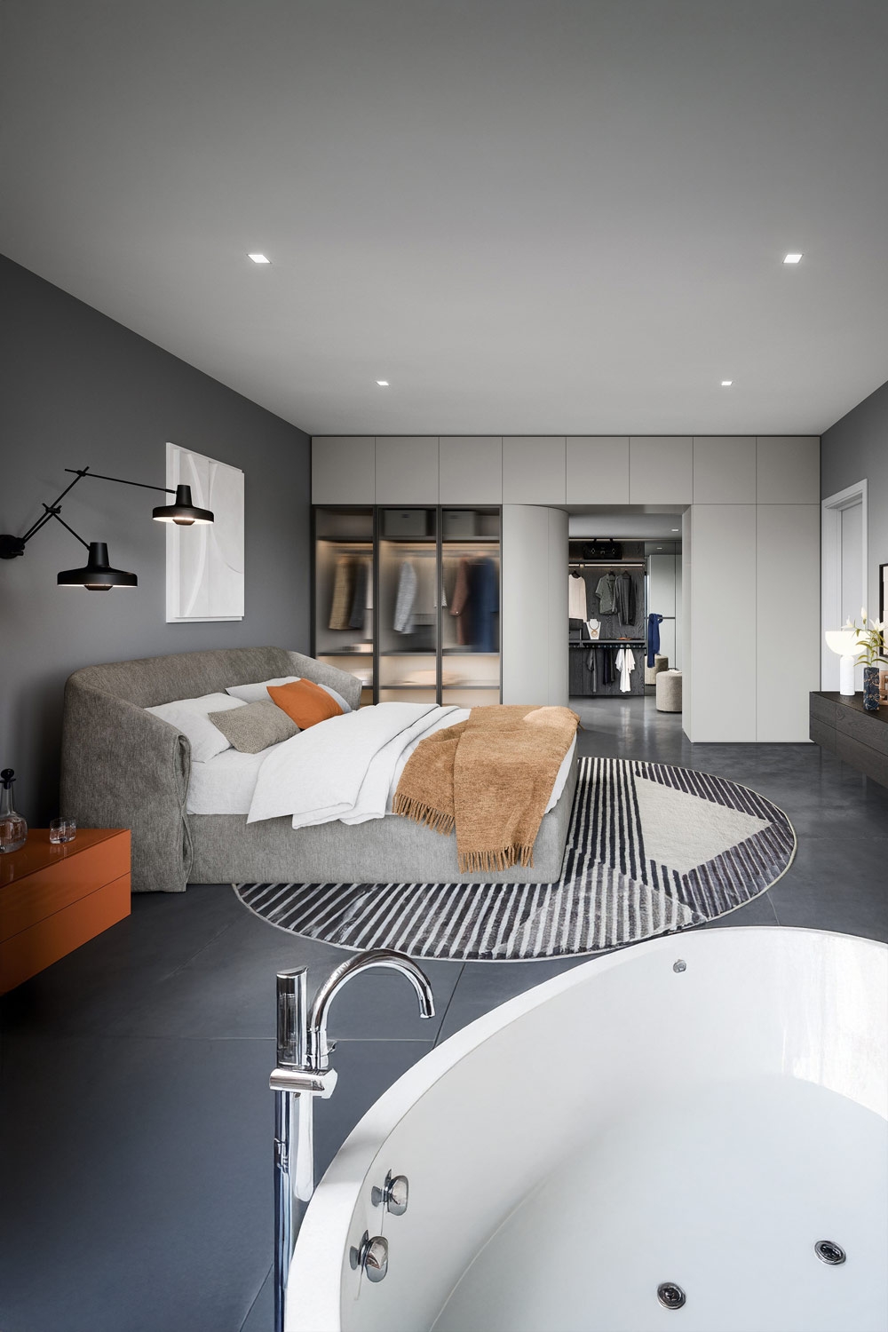 chambre-spacieuse-avec-lit-rembourre-marquant-armoires-extravagantes-et-jacuzzi