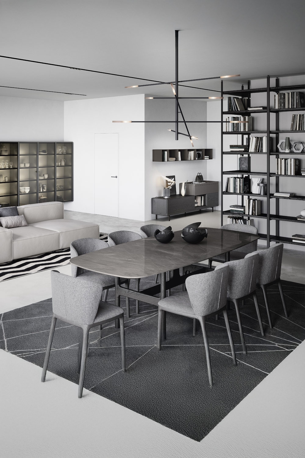 salon moderne en gris, noir et blanc avec table &agrave; manger de forme organique