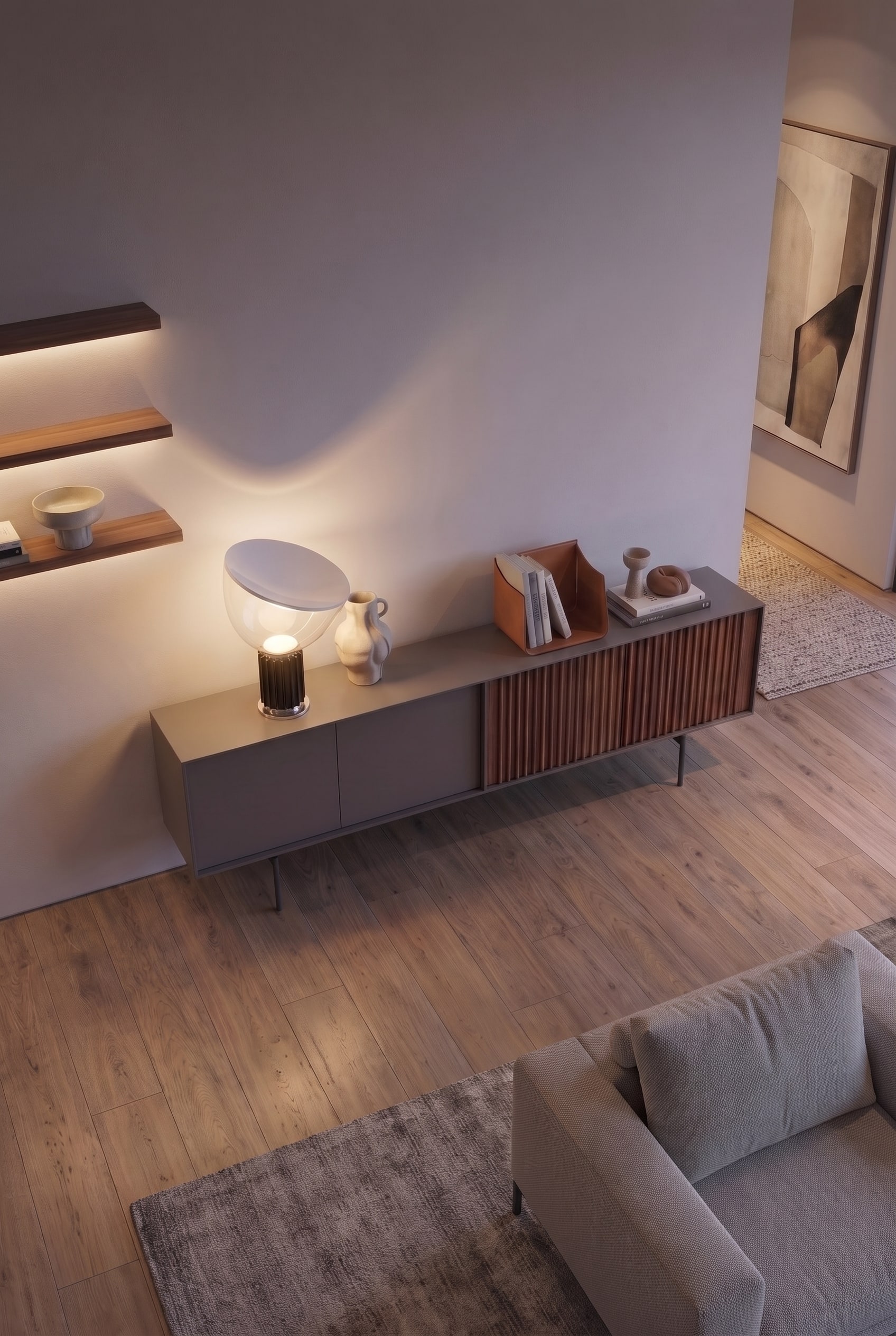 Vue plongeante sur un &eacute;l&eacute;gant buffet, montrant la r&eacute;partition asym&eacute;trique de la fa&ccedil;ade en laque mate et lamelles de bois.