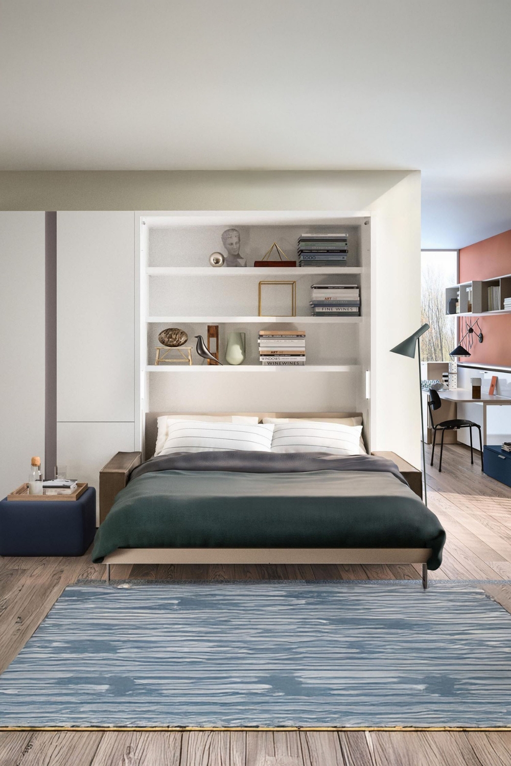 lit escamotable déplié et une commode avec bureau au design moderne