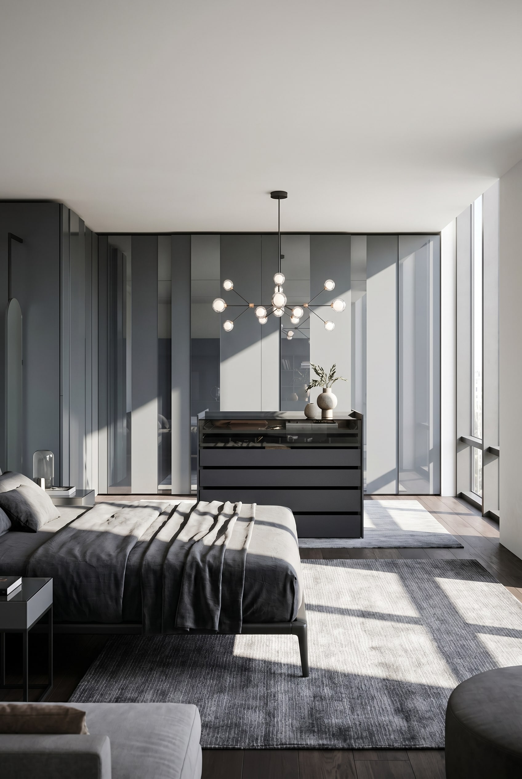 Elegante dunkle Schrankinsel mit Glasabdeckung und Schubladen inmitten einer hellen Ankleide mit Terrazzo-Boden
