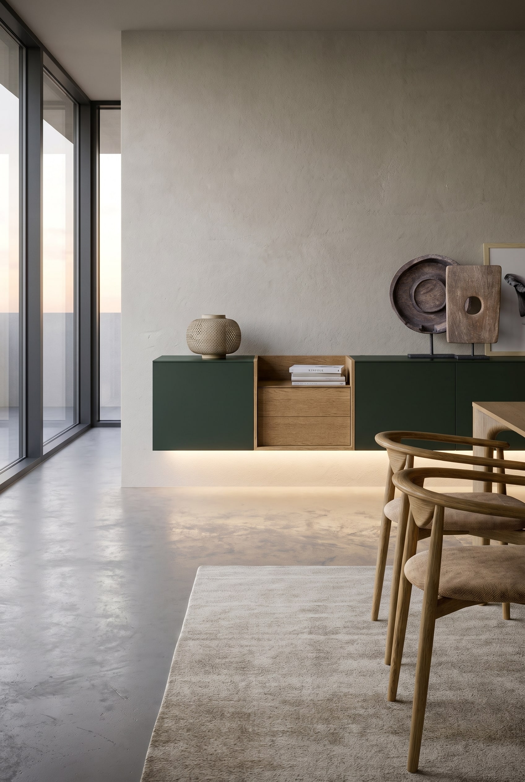 Salle à manger minimaliste avec sideboard mural, éclairage indirect du socle et un tapis élégant