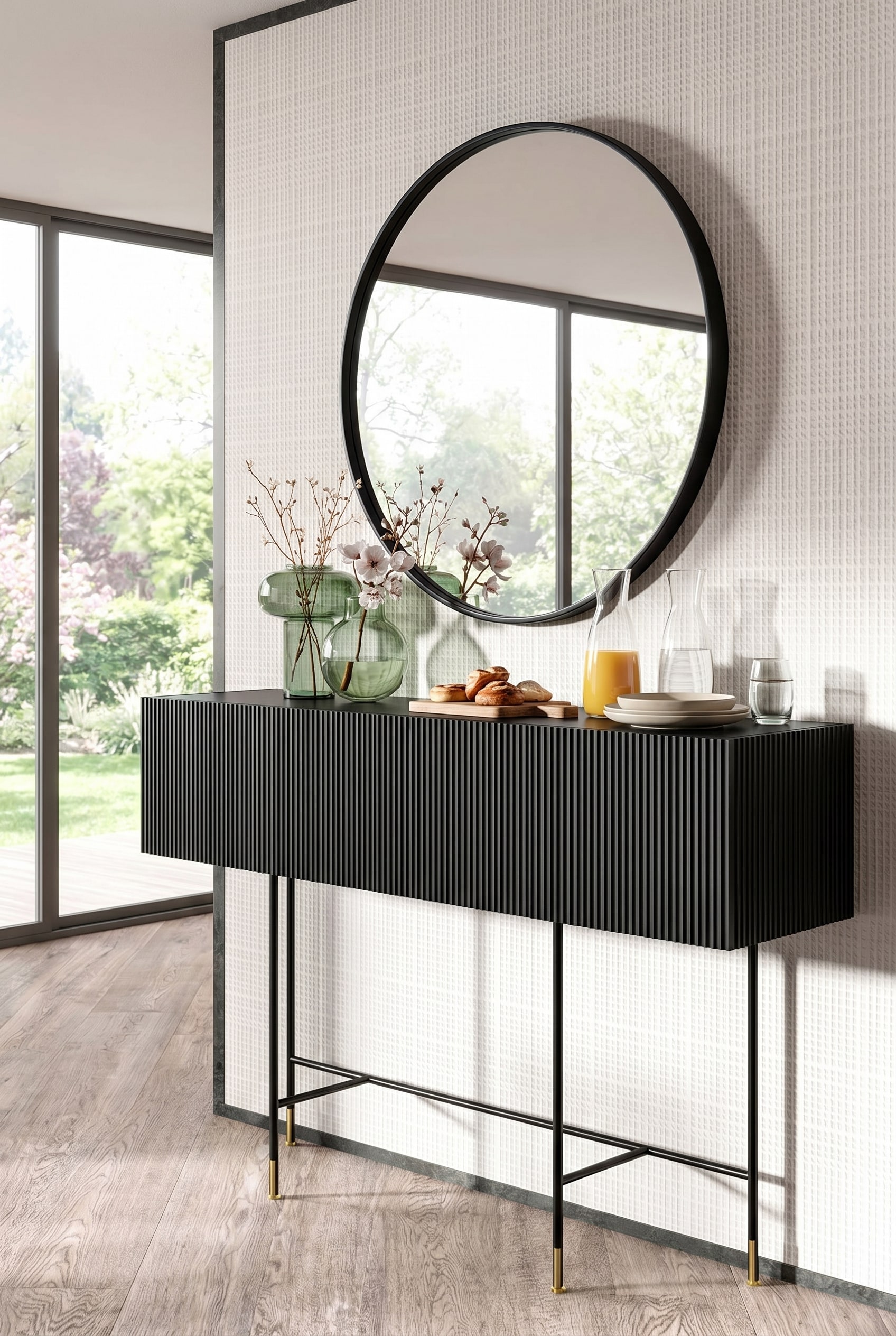 &Eacute;l&eacute;gant buffet Capo d'Opera Aero Bar noir avec fa&ccedil;ade cannel&eacute;e, d&eacute;cor&eacute; de vases en verre verts et d'un miroir rond en arri&egrave;re-plan, id&eacute;al pour le brunch de printemps.