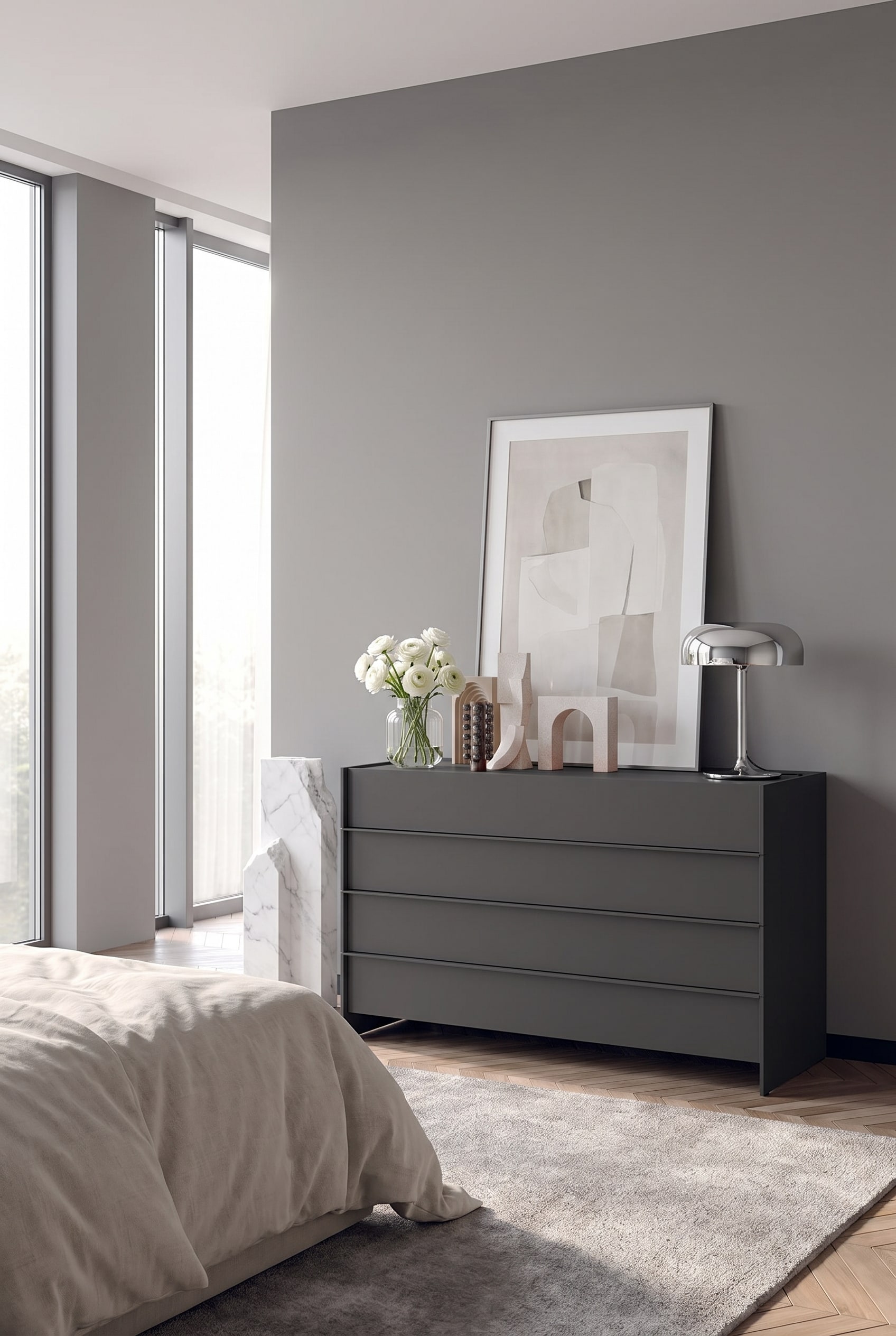 Commode minimaliste sans poign&eacute;e en gris clair, se fondant ton sur ton avec le mur de la chambre &agrave; coucher