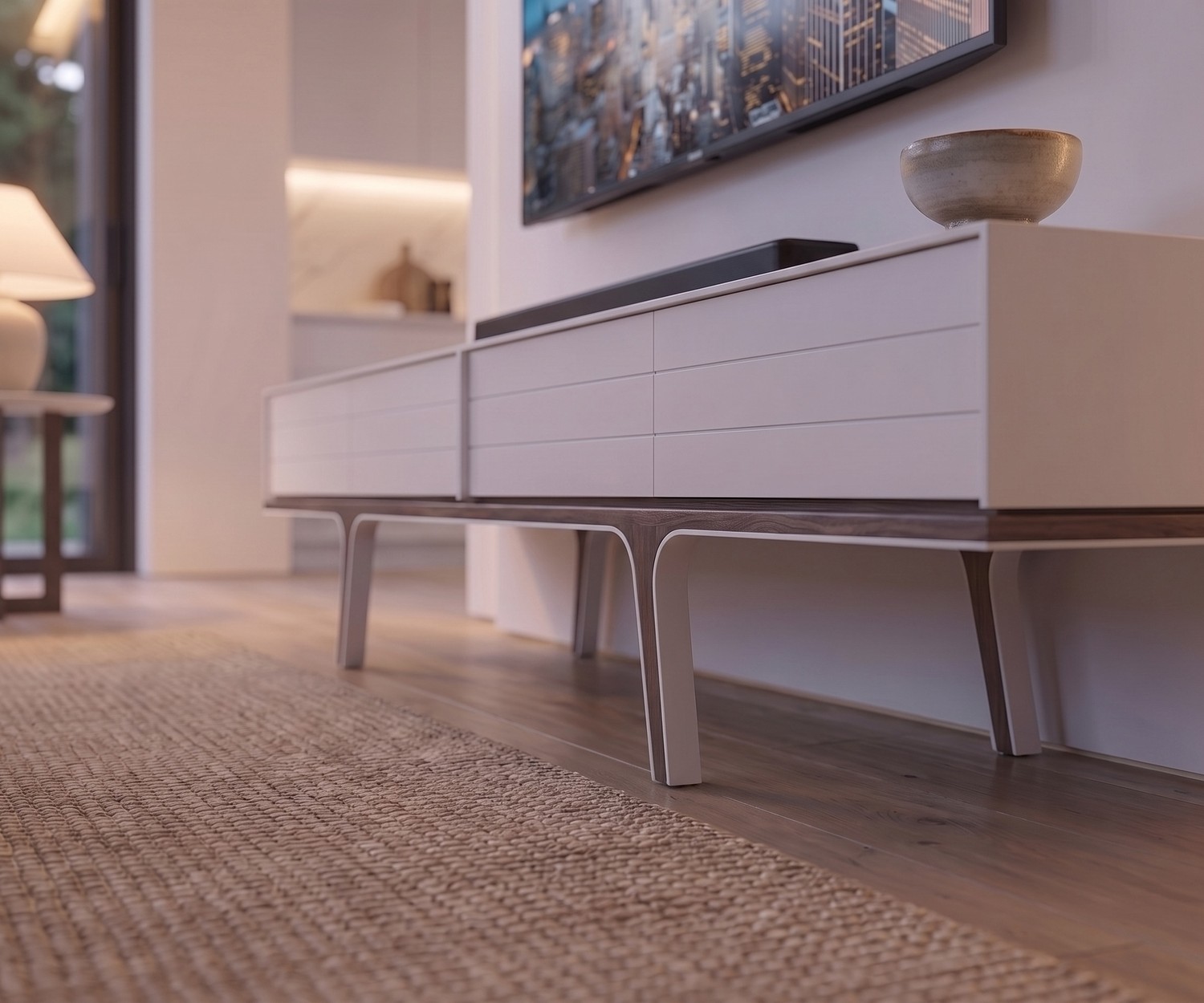 Design TV-Lowboard al2 Mobius 004 für das Wohnzimmer in Weiß matt mit massiven Beinen aus Eukalyptusholz.