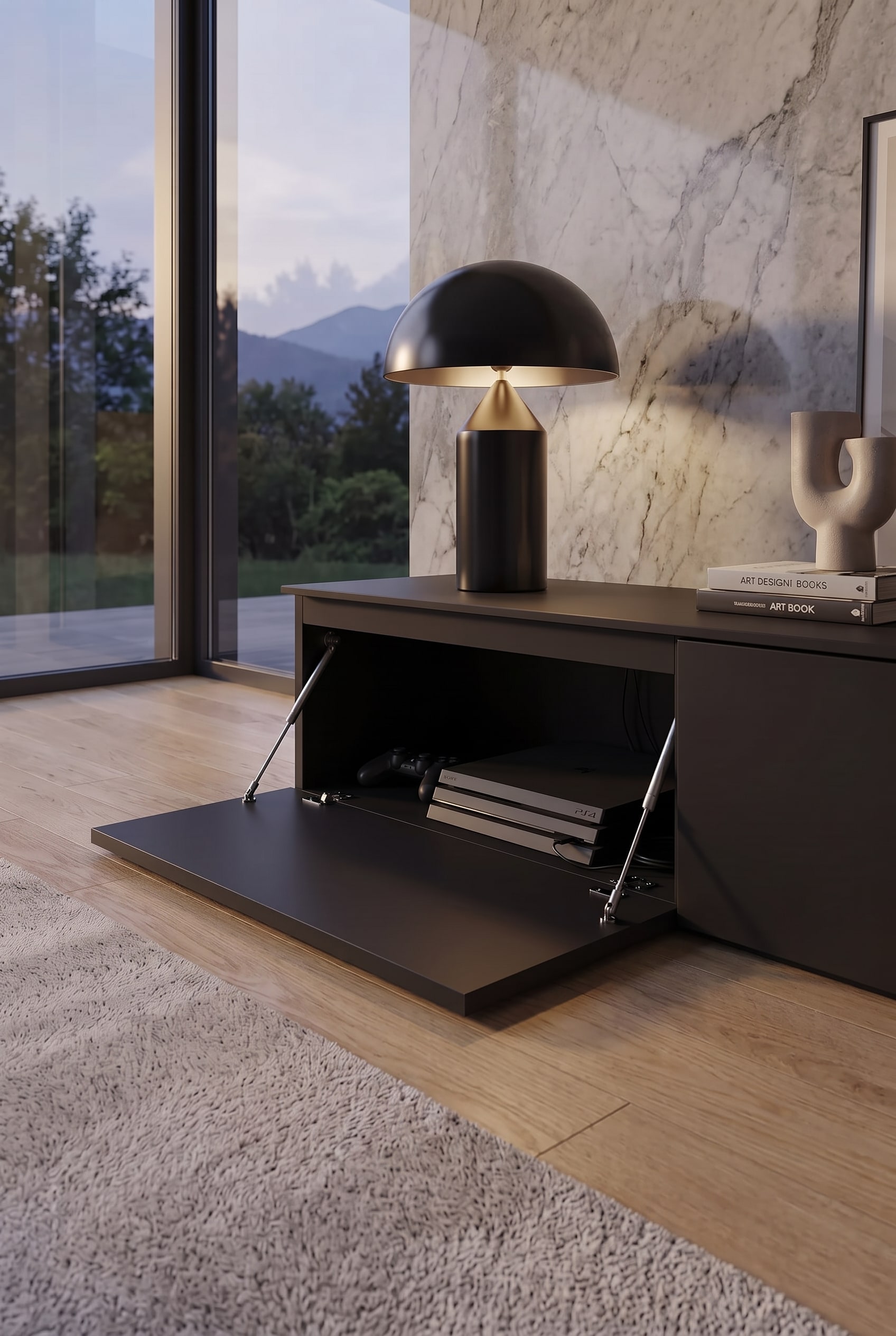 Abattant ouvert d'un meuble bas gris fonc&eacute;, montrant une PlayStation 4 &agrave; l'int&eacute;rieur devant un mur de marbre.