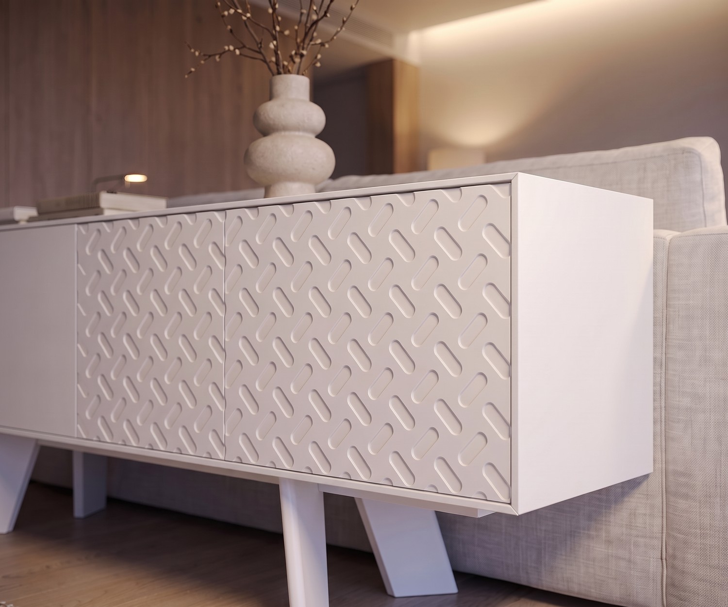Design Sideboard Alhambra 003 im modernen Wohnzimmer als Raumteiler hinter dem Sofa, Weiß mit Struktur-Fronten.