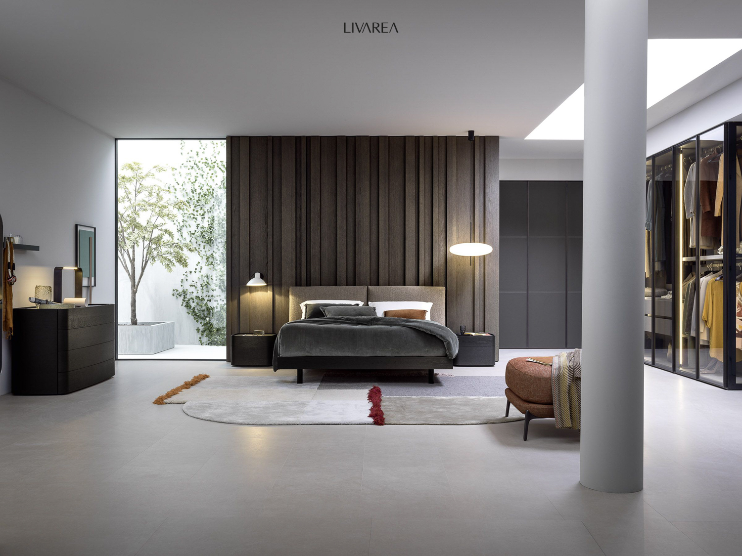 Belle chambre design avec lit central capitonné et 2 tables de nuit Belle chambre design avec lit central capitonné et 2 tables de nuit