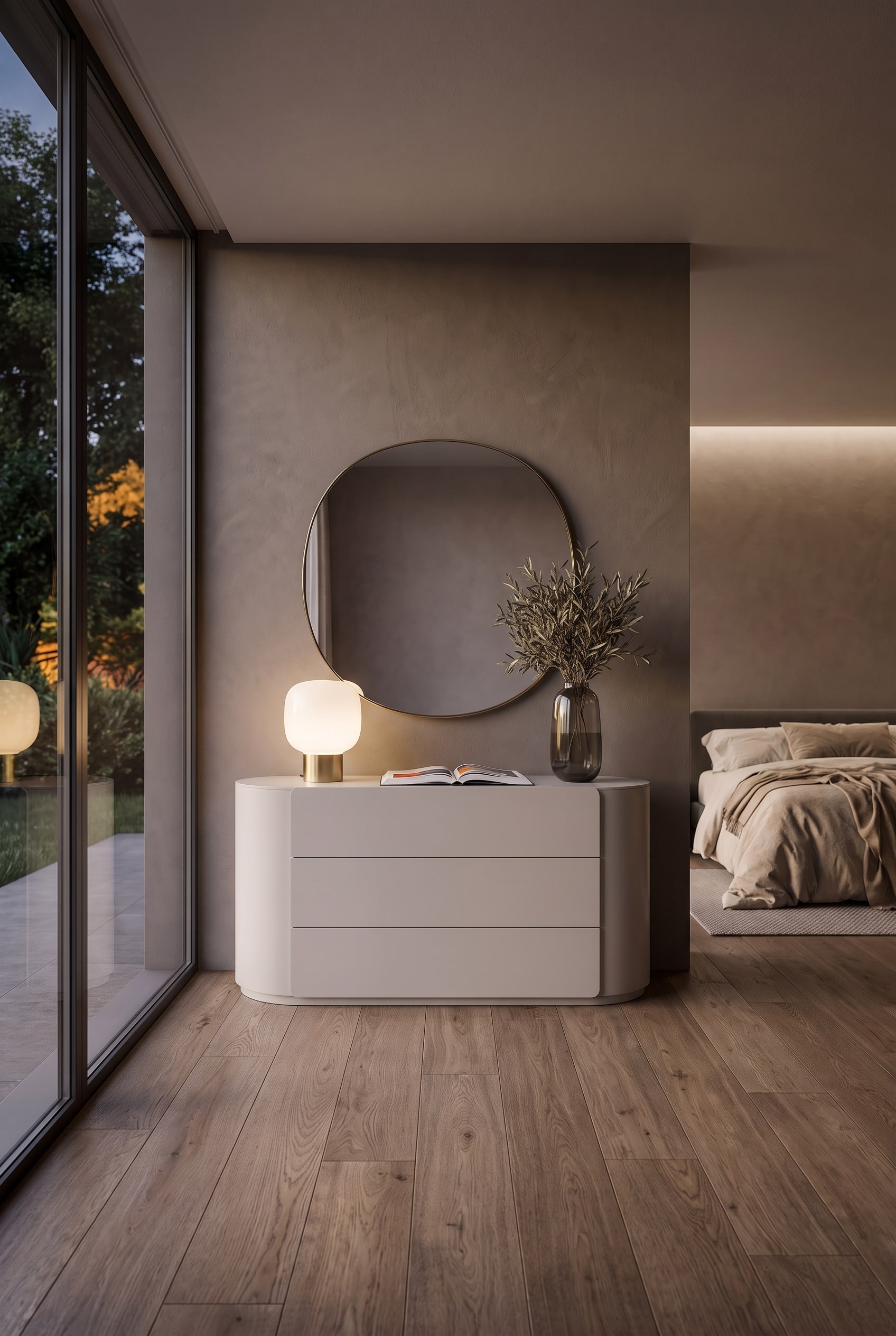 Commode gris clair mat aux coins arrondis dans une chambre moderne avec un grand miroir.
