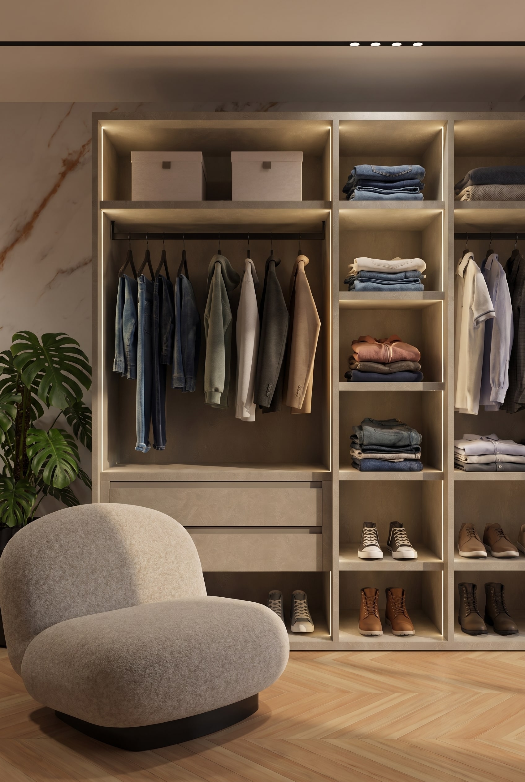 Syst&egrave;me d'armoire ouverte dans une chambre d'adolescent avec des montants m&eacute;talliques verticaux, des &eacute;tag&egrave;res en bois fonc&eacute; et des v&ecirc;tements strictement tri&eacute;s par couleur
