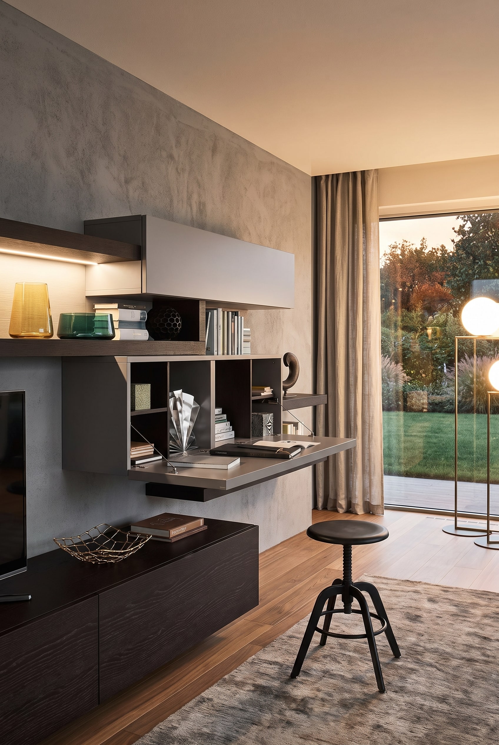 Coin salon avec meuble haut dont la façade s'ouvre en bureau et un ordinateur portable