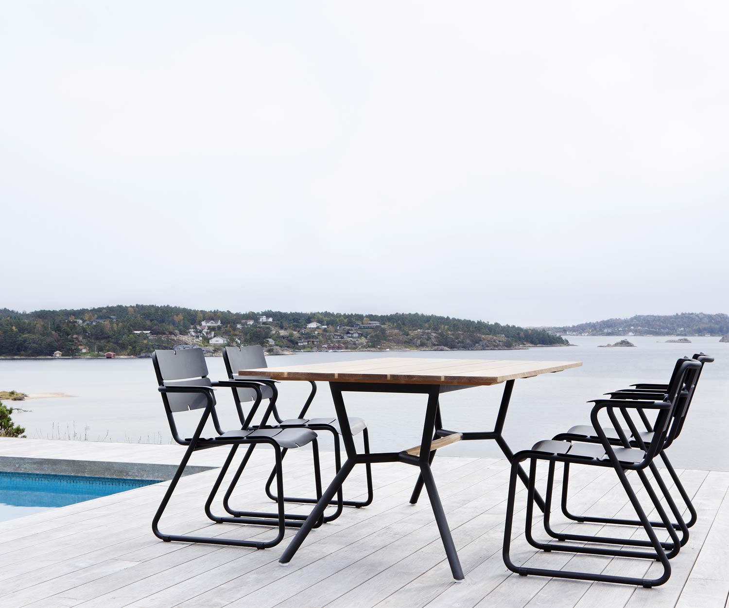 Exclusif Oasiq Corail Design chaise à accoudoirs avec table Reef Exclusif Oasiq Corail Design chaise à accoudoirs avec table Reef
