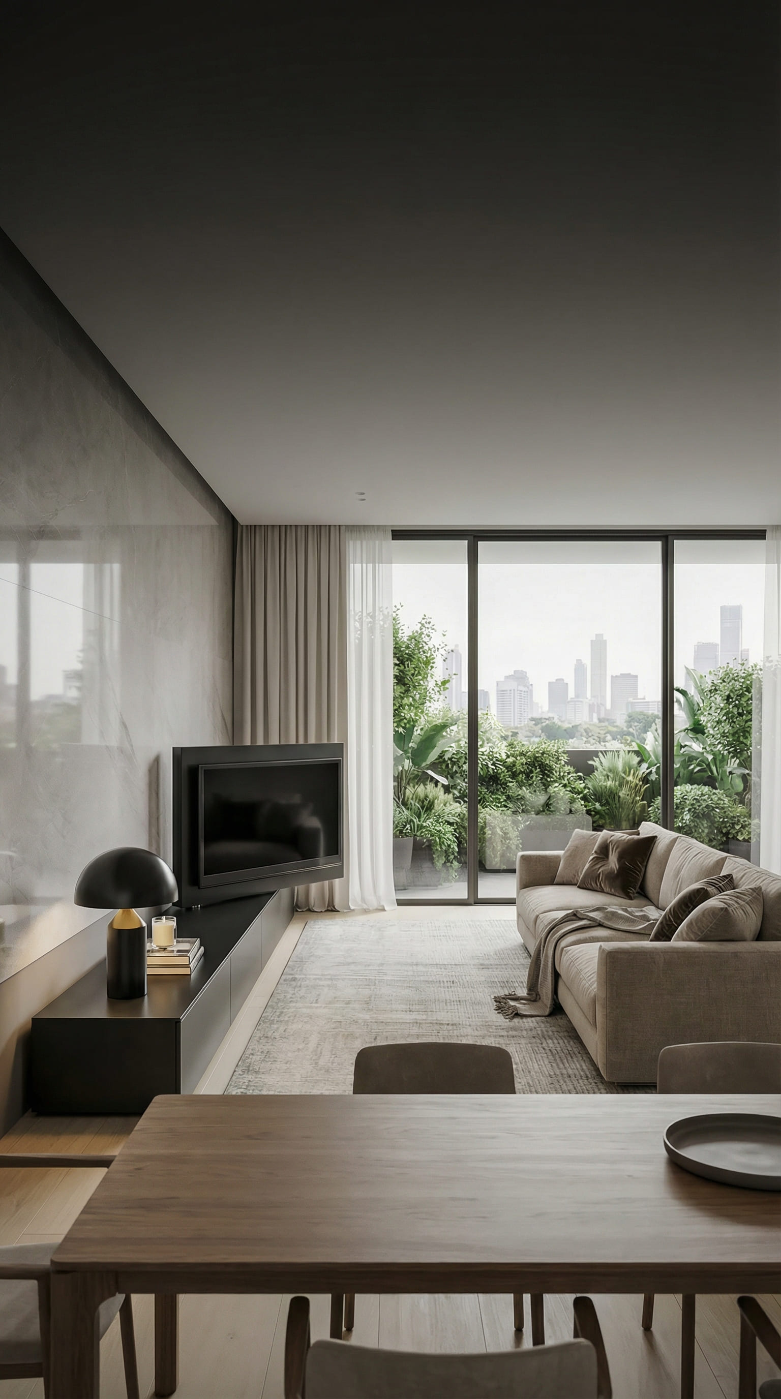 Meuble TV bas avec t&eacute;l&eacute;viseur pivot&eacute; &agrave; 90 degr&eacute;s vers la table &agrave; manger