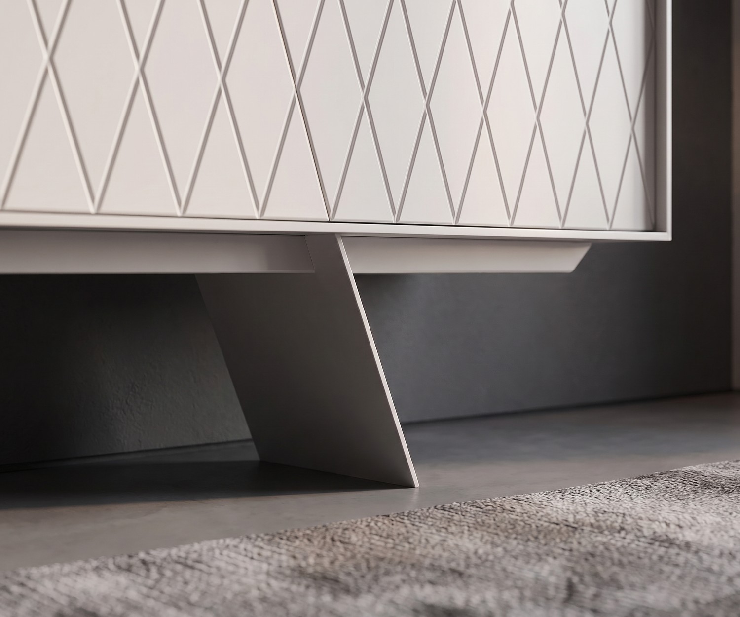 al2 e-klipse 003 Design Sideboard mit Rautenmuster al2 e-klipse 003 Sideboard im Wohnzimmer mit weißem Rautenmuster und eleganten, schrägen Standfüßen im modernen Design.