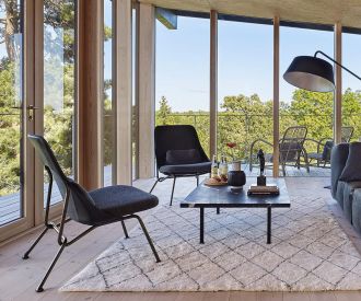 Haute qualité Prostoria Fauteuil design Strain Cuir noir Structure en noir
